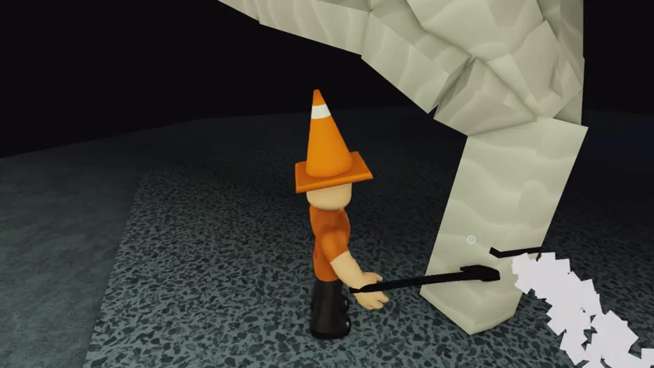 A player swinging a black axe into a white tree trunk, sending pale chips flying