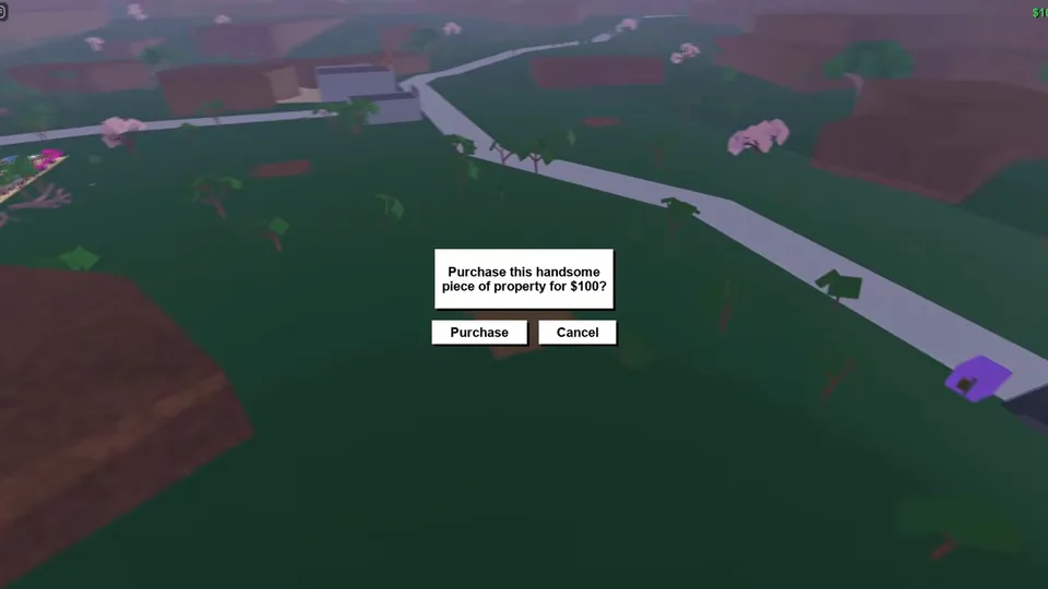 An overhead view of grassy land and a road, with a small purchase box in the middle of the screen