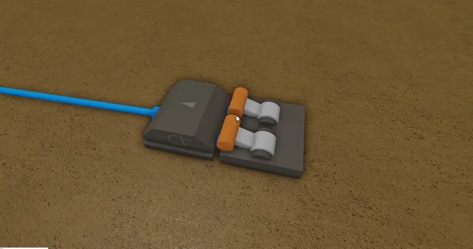 Two orange-handled levers beside a grey logic gate with a small arrow and a blue wire